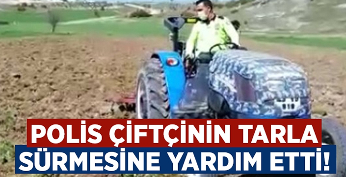 Polis tarlasını süren çiftçiye yardım etti!