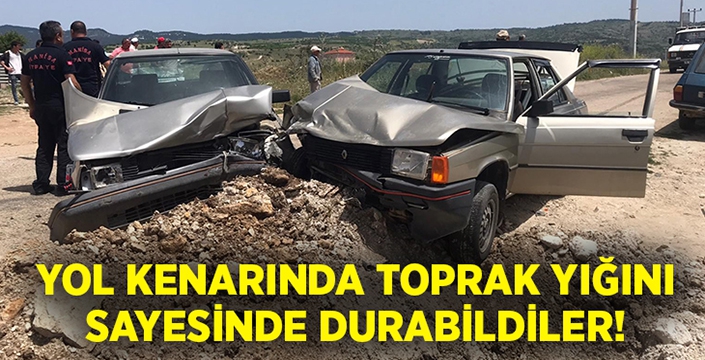 Yol kenarındaki toprak yığını sayesinde durabildiler